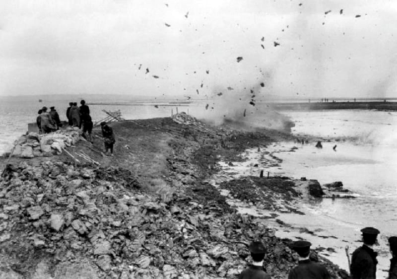 Royal Engineers blow a gap in the seawall